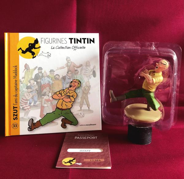 Tintin (figurines Moulinsart) # 33 - Szut - en boîte avec livret + passeport